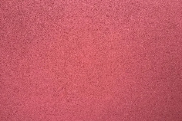 Empty red concrete wall, clean texture background surface.