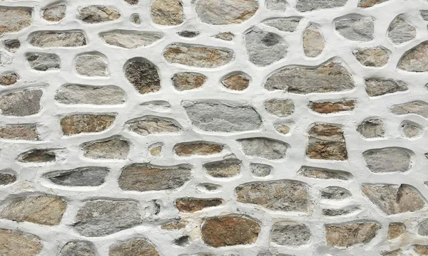 古い石壁の背景、シームレスなアシュラー石壁のテクスチャ. — ストック写真