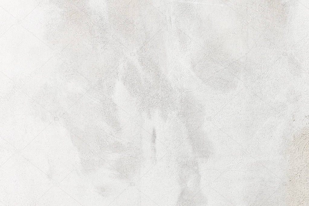 white washed painted concrete wall texture abstract background with brush strokes in gray and black shades.