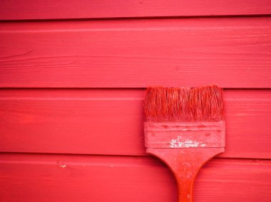 Ahşap arka plan üzerinde eski boya fırçası .