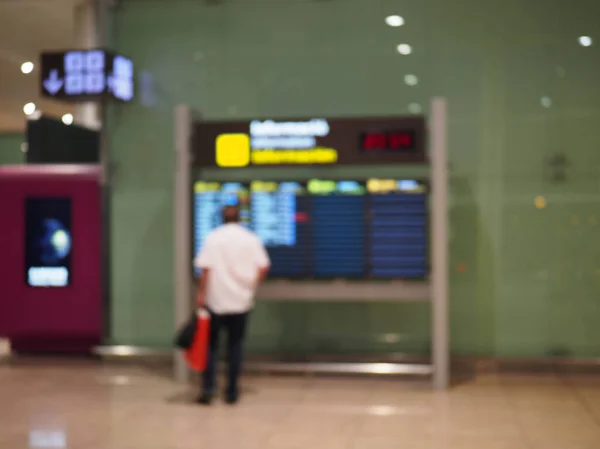 Blurry image of arrival and departure Board — Stock Photo, Image