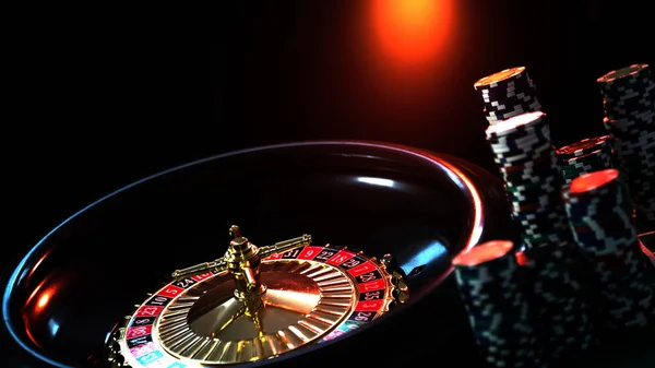 Casino background, poker Chips on gaming table, roulette wheel in motion,