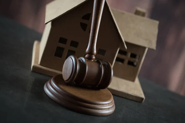 wooden gavel and house mockup, justice and law concept