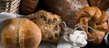 variety of fresh homemade breads and pastries clipart