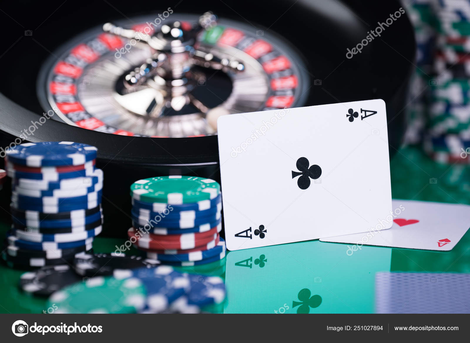 Casino Background Poker Chips Cards Gaming Table Roulette Wheel Motion Stock Photo Image By Aerialmike 251027894