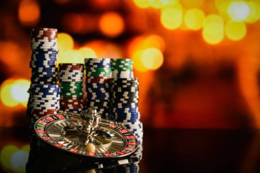  casino background, poker chips on gaming table, roulette wheel in motion clipart
