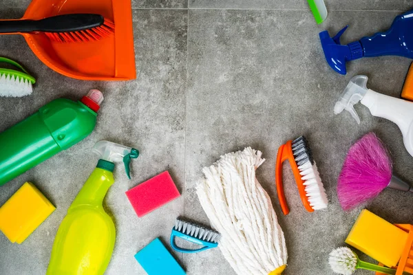 Home cleaning concept. Frame of various Cleaning Products, place for typography