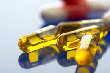 Close up of colorful pills for treatment. clipart