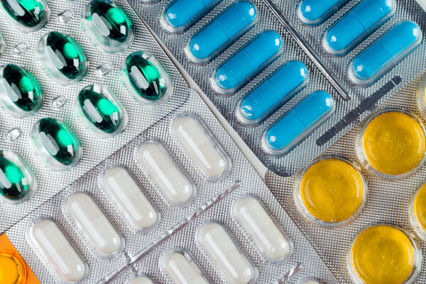 Close up of colorful pills for treatment.