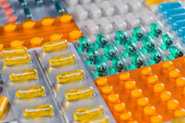 Close up of colorful pills for treatment.