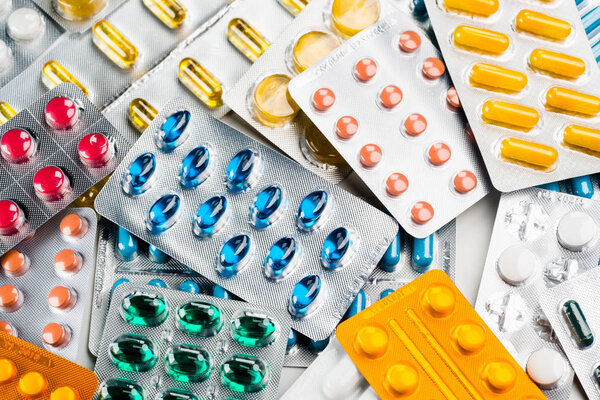 Close up of colorful pills for treatment.