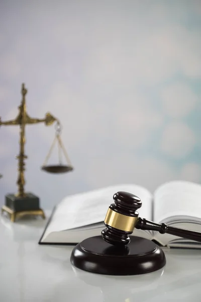 Huge judge\'s wooden gavel on blurred background