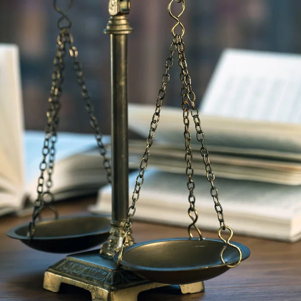 Law and Justice, scales on table.