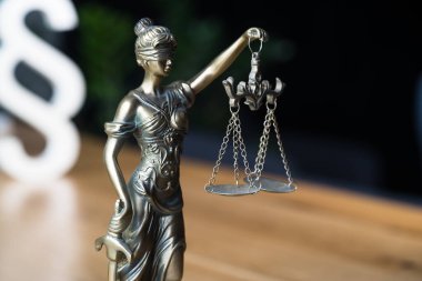 Statue of Justice. Closeup of figure of lady justice or justitia  clipart