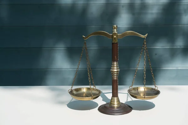 Closeup of balance scales, weight balance. Law and justice concept