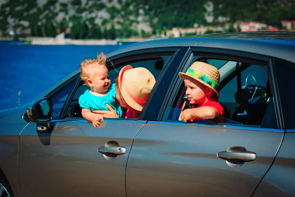 happy family travel by car on sea vacation