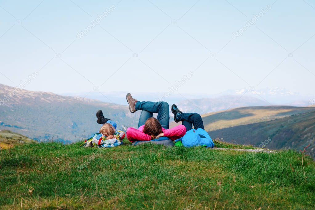 family- mother and kids relax in mountains, nature travel