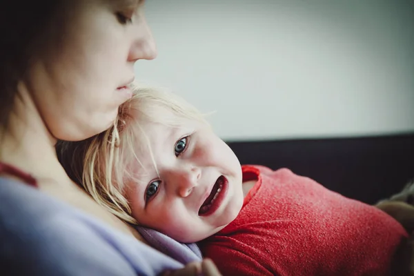 Mother comforting crying little baby, care and support — Stock Photo, Image