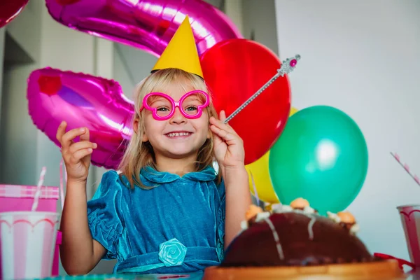 Happy cute little girl at birthday party — Stock Photo, Image