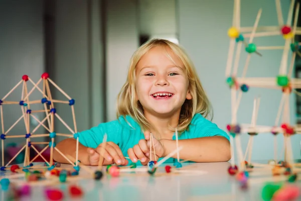Child making geometric shapes, engineering and STEM — Stock Photo, Image