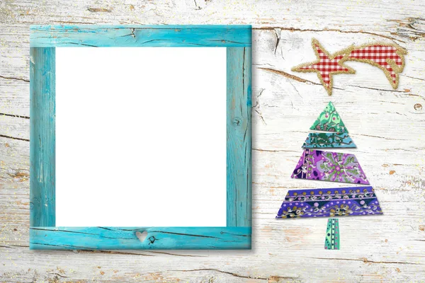 クリスマス降誕フォト フレーム カード ベツレヘムの星のクリスマス ツリーは ファブリックを使用した切り欠きと素朴な木の写真や挨拶のメッセージの隔離された木製フレーム — ストック写真