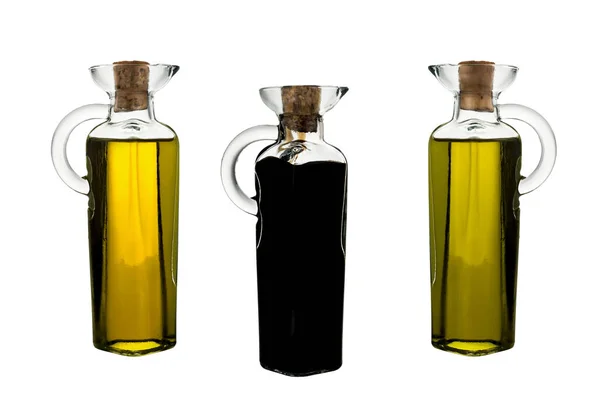 Panenský olivový olej ve dvou skleněných lahvích a modenu balsamikovou OCTG — Stock fotografie