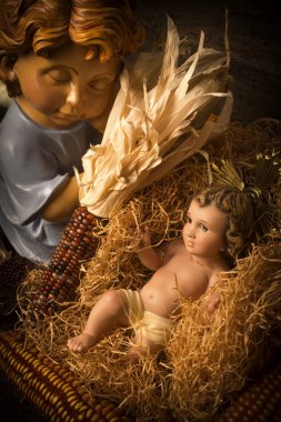 Noel kartları. Bebek İsa bir melekle ilgileniyor.