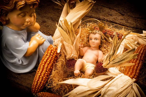 Bebê Jesus cuidado por um anjo, cartão de Natal . — Fotografia de Stock