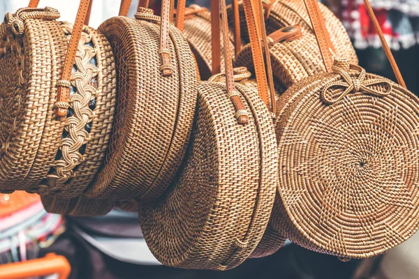 Rattan round bags at a street shop. Bali, Indonesia.