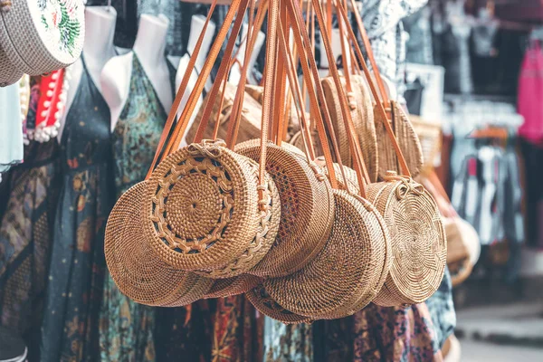 Rattan round bags at a street shop. Bali, Indonesia.