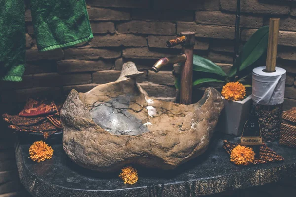 Stone sink in the bathroom of luxury hotel