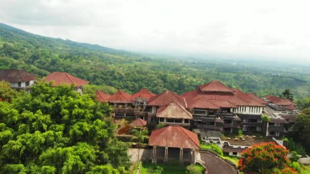Aerial drone video of abandoned hotel in Bedugul, Bali island. — Stock Video