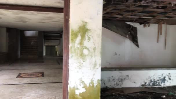 Interior of abandoned damaged and destroyed hotel on Bali island. — Stock Video