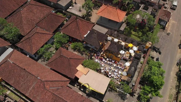 4K aerial view of traditional balinese houses. Flying over balinese village. Bali island. — Stockfoto