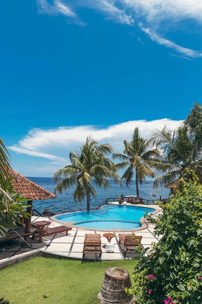 Tropical swimming pool with no people. Dream island. Luxury resort. Bali island, Indonesia.