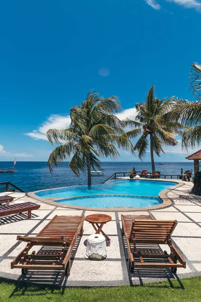 Tropical swimming pool with no people. Dream island. Luxury resort. Bali island, Indonesia.