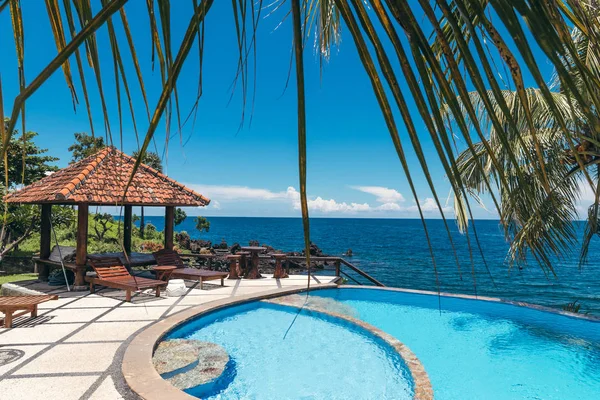 Tropical swimming pool with no people. Dream island. Luxury resort. Bali island, Indonesia.