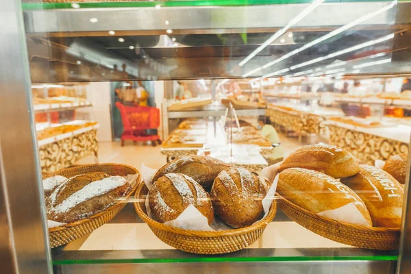 Closeup of bread in the bakery shop. Fresh bread. Organic bread background. Bali island. — Stock Photo, Image