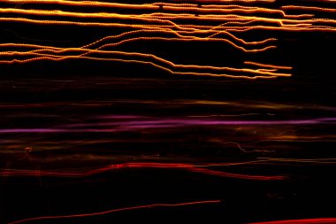 Şehir galaksisi. Orijinal ışık resmi, uzun pozlama. Soyut fotoğrafçılık.