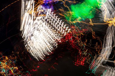 Şehir galaksisi. Orijinal ışık resmi, uzun pozlama. Soyut fotoğrafçılık.