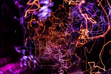 Şehir galaksisi. Orijinal ışık resmi, uzun pozlama. Soyut fotoğraf arkaplanı.