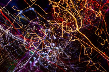 Şehir galaksisi. Orijinal ışık resmi, uzun pozlama. Soyut fotoğraf arkaplanı.