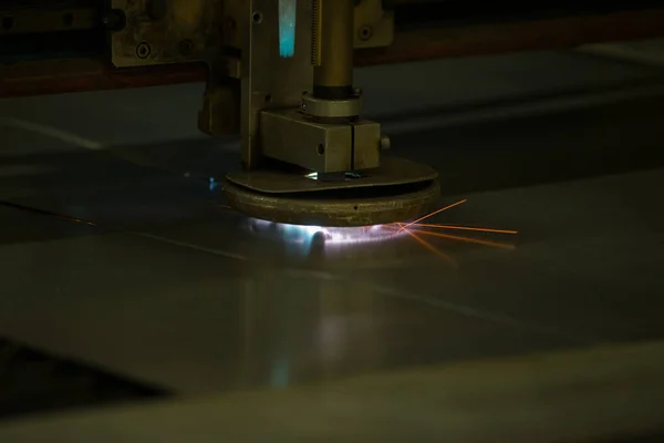 Plasma cutting of metal.Cutting of metal. Sparks fly from laser