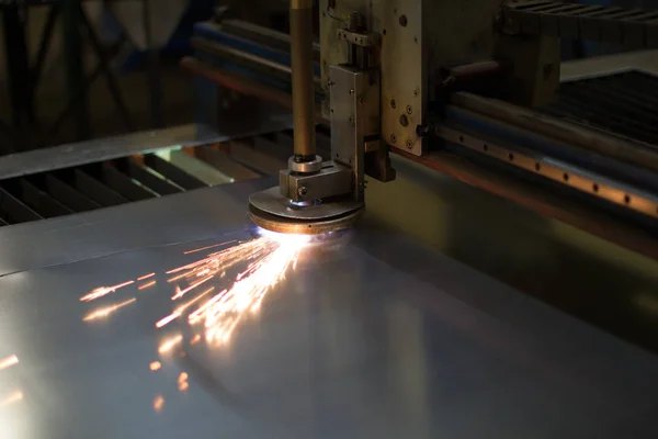 Plasma cutting of metal.Cutting of metal. Sparks fly from laser