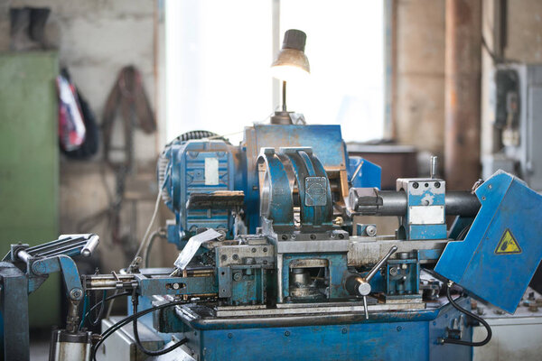 Belarus, Gomel, 25 April 2018. Factory for the manufacture of ventilation pipes.The old machine in the Russian factory for metal cutting