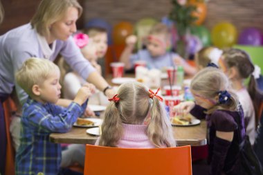 Belarus, Gomel, October 13, 2018. Holiday in the city. Children's Pavilion.Children's party . Birthday child with guests at the table
