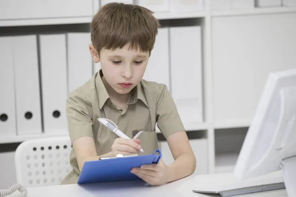 Junior School Student Does His Homework Boy Pen His Hands — Stock Photo, Image