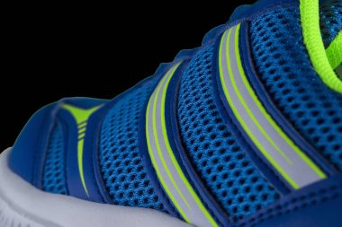 Mavi bir spor ayakkabının bir parçası. Spor ayakkabı doku