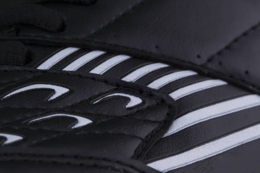 Siyah beyaz spor ayakkabı parçası. Spor ayakkabı malzemenin dokusu