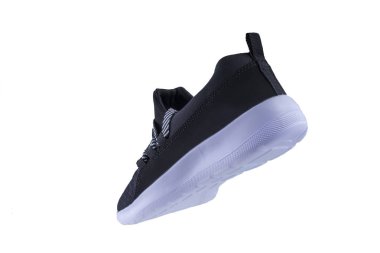 Sneaker. Spor ayakkabılar beyaz bir arka plan üzerinde yan görünüm. Beyaz tabanlı siyah ayakkabı